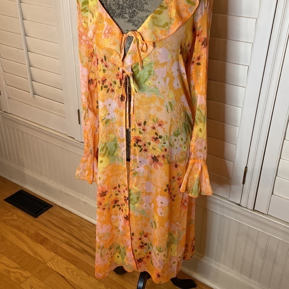 Women's Ruffle Duster Jacket - Wild
Fable Orange Floral - Picture 7 of 10